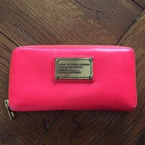 Fierce, well-loved fuchsia wallet